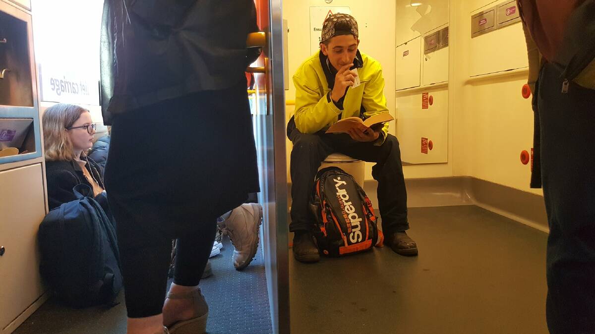 SIT ANYWHERE: A commuter's humorous view on what overcrowding drives V/line passengers to find a seat.
