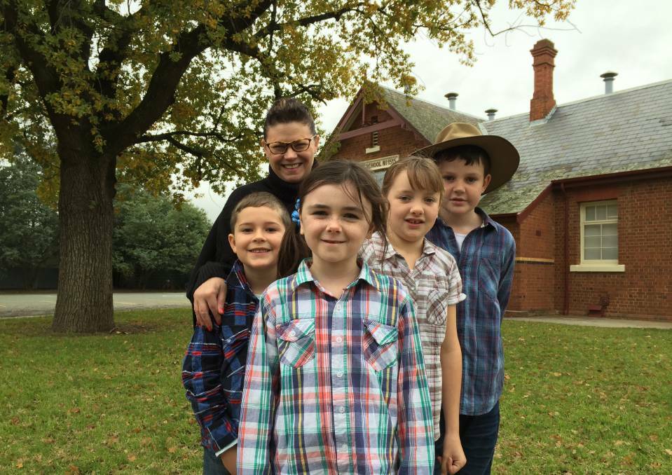 HOPE FOR FUTURE: Michelle Griffiths with Elmore Primary School students Patrick, Paige, Kaitlyn and Hamish – the principal wants her students to learn professional skills they can bring back into town. Pictures: JOSEPH HINCHLIFFE