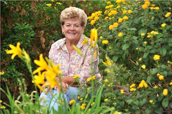 BLOOMING GOOD: Eaglehawk Dahlia and Arts Festival flower show co-ordinator Marg Ashman prepares for the annual event.