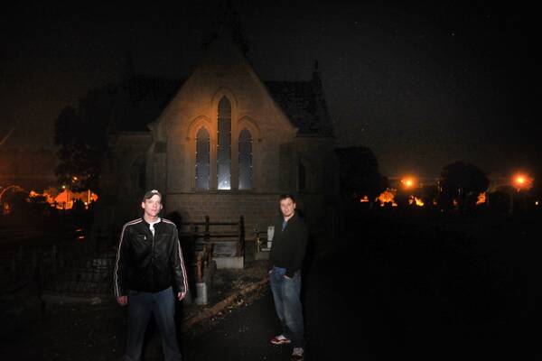 GHOST HUNTERS: Tony and Chris Jordon brave a chilling night at Bendigo Cemetery. Picture: BRENDAN McCARTHY