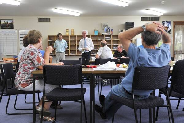 LEARNING: Martin Dixon speaks to teachers in the staff room at Rochester Secondary College.