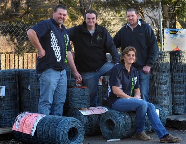 BIG HELP: Frank Harney, Elmore Charity Ball Committee; Karl Metcalf; Sam Shotton, Charity Ball secretary; and Brian Mullane with $16,500 worth of donated fencing material.