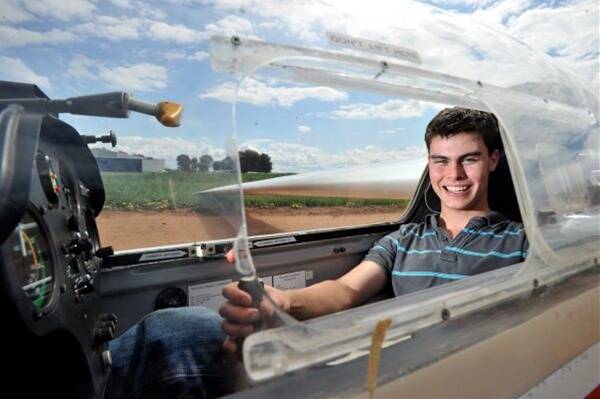 SKY’s THE LIMIT: Tom Howard in a glider he flies at the Bendigo Glider Club in Raywood.