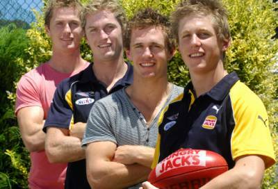 BROTHERS IN ARMS: Troy, Adam, Joel and Scott Selwood after Scott was drafted by West Coast on Saturday.