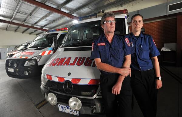 tough job: Bendigo paramedics Brad Kenyon and Carly Newman. Picture: ALEX ELLINGHAUSEN