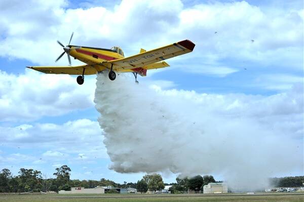 UP AND AWAY: DSE and CFA staff combined for an exercise at Bendigo Airport. Picture: ALEX ELLINGHAUSEN