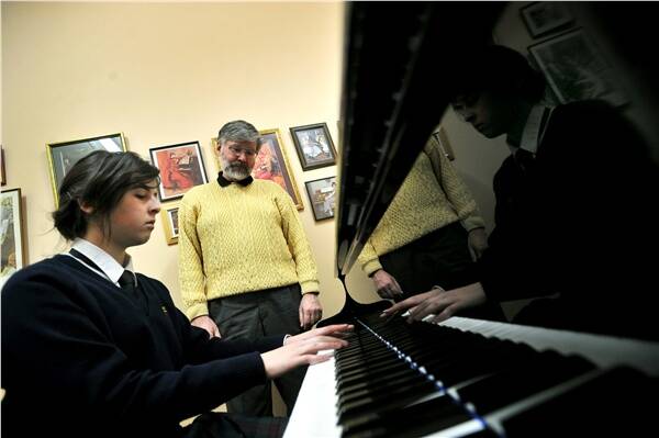 Girton Grammar School student Ashleigh Jones with internationally recognised pianist Geoffrey Tozer.