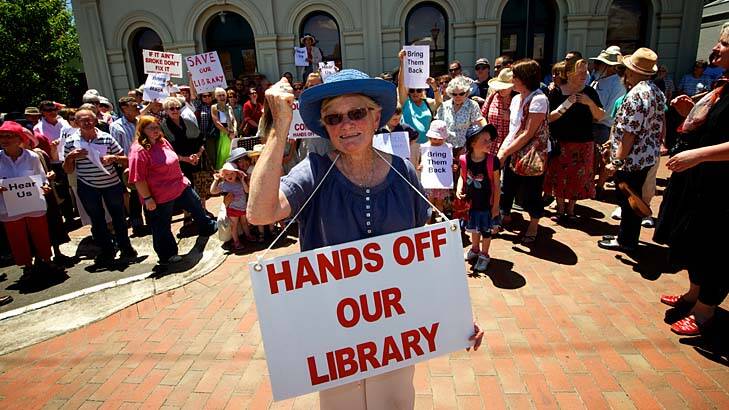 Angry words: Marg Scott, secretary of the Friends of Alexandra Library, and other members stage their protest.