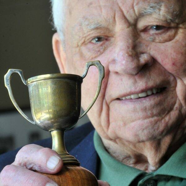 TRADITION: Alf Maskell, who rode to victory in the 1943 race, with the Prisoner of War Melbourne Cup.
