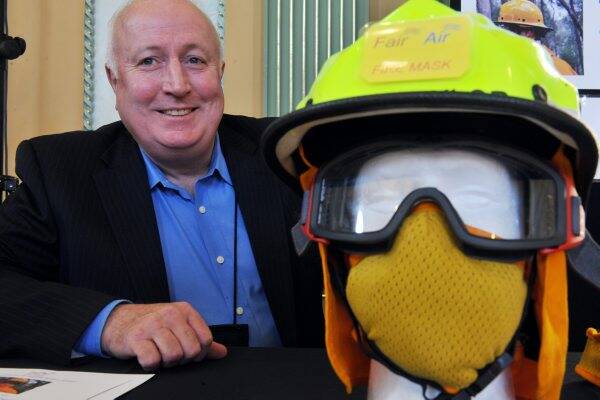 Success: Mandurang firefighter Mike Taylor with his fair air fire mask that earned him $10,000 and the Innovator of the Year title at last night’s inventor awards.