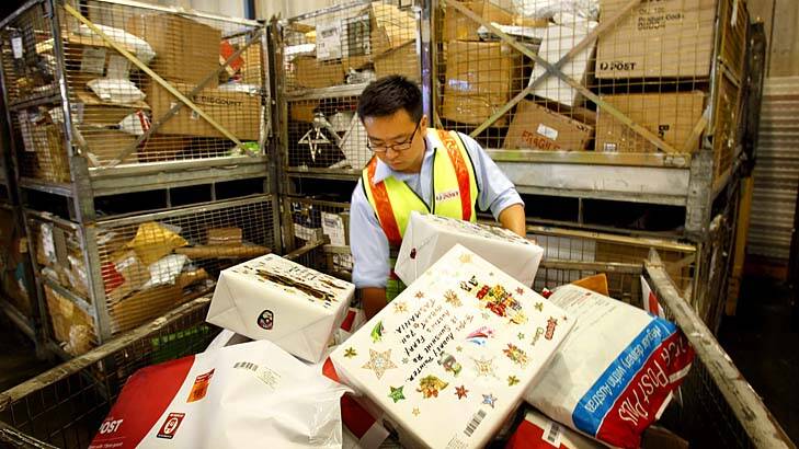 You've got mail ... Kwong Chuen, facility manager at Australia Post Alexandria. An extra 2000 staff have been hired to cope with a record parcel post.