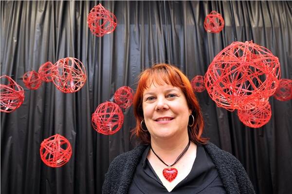 ROSY: Robbie Buckman with part of her creation capturing the colour red.
