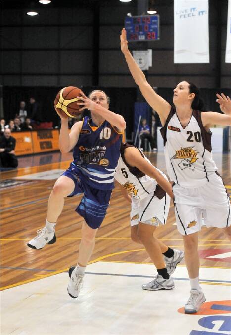 STAR: Kristi Harrower on her way to a game-high 32 points.
