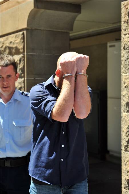 ACCUSED: Clint Sendall, 33, is led from Bendigo Magistrates Court.