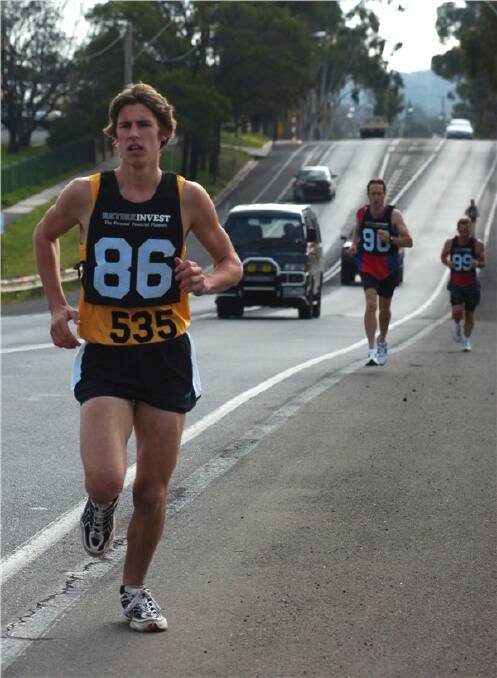 RUNNING ON: Josh Bywaters races along Eaglehawk Road.
