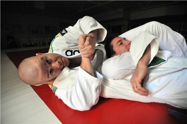 STRENGTH: Machado Brazilian Jiu Jitsu black belt Stewart Moulden in training with Mal Crane. Picture: BILL CONROY