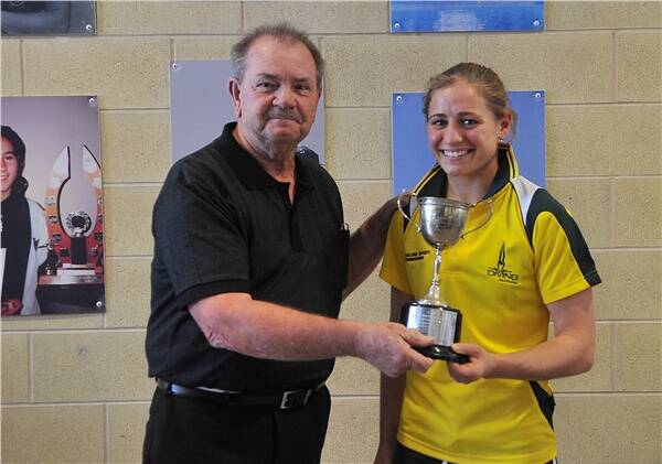 MASTERFUL: Ron Masters (nephew) with Bree Mellberg, the winner of the Ron Masters Best Diver Award.