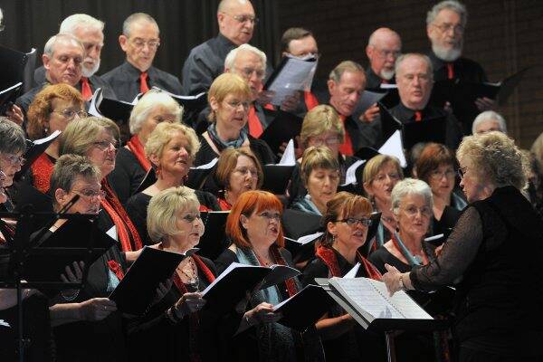 Harmony: The Central Victorian Women’s Choir, along with a section of the Victoria Welsh Choir, impressed a packed house at the Strathdale Hall yesterday. Picture: Julie Hough