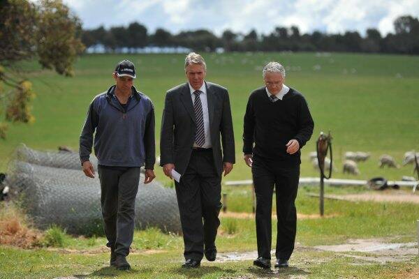 BOUNTY: Farmer Bruce Bickford, Agriculture Minister Peter Walsh and Member for Northern Victoria Damian Drum discuss the reintroduced fox and wild dog bounty. Picture: Matt Kimpton