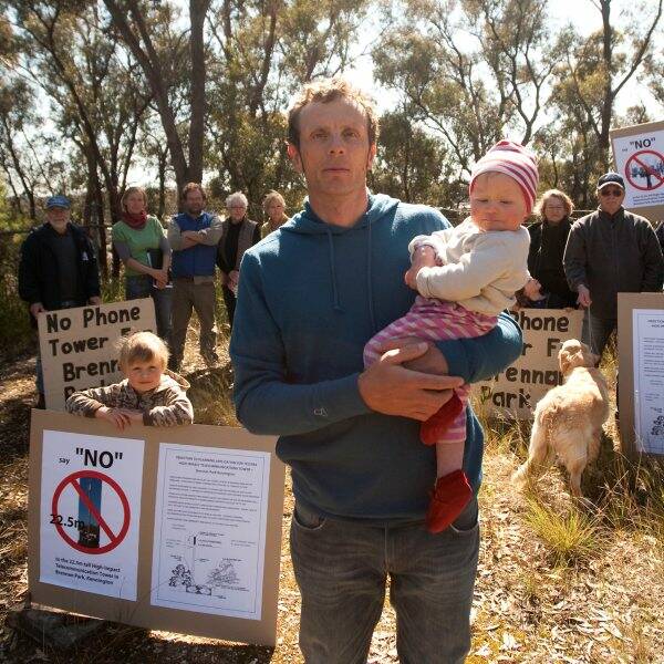 INCENSED: Residents take a stand against the installation of the phone tower in Brennan Park. Picture: Matt Kimpton
