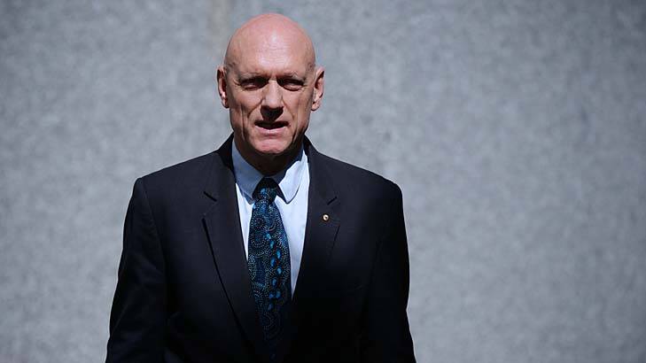Minister for School Education, Early Childhood and Youth, Peter Garrett, speaks to the media during a doorstop interview at Parliament House. Photo: Alex Ellinghausen