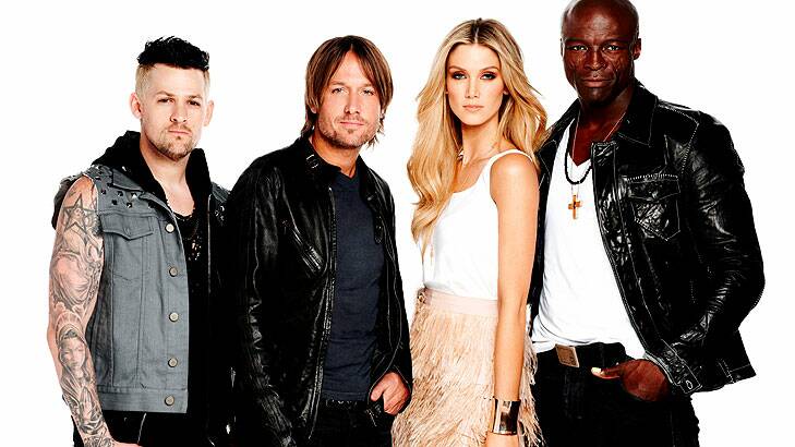 Urban with Joel Madden, Delta Goodrem and Seal, his fellow coaches from the first season of <i>The Voice</i>.