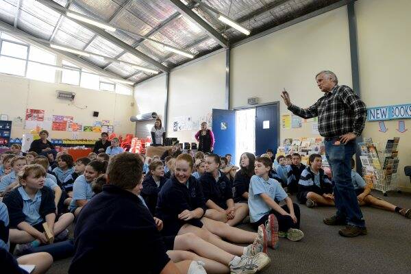 Exciting: Australian author John Marsden speaks to students at Maiden Gully Primary School yesterday.   Picture: Matt Kimpton