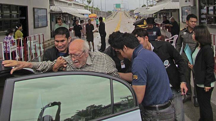 Under escort … Karl Joseph Kraus is escorted, against his will, across the Burmese border into the hands of Thai police.
