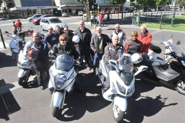 ENTHUSIASTS: Bendigo Scooter Club members meet for a ride through the country side. Picture: PETER WEAVING