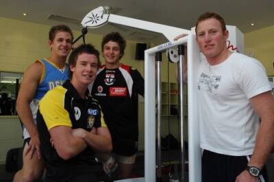 READY FOR WORKOUT: AFL recruits Joel Selwood, Jarryn Geary and Andy Collins with Evolution Fitness manager and the Bendigo Pioneers Football Club’s fitness coach Marty O’Rielly.