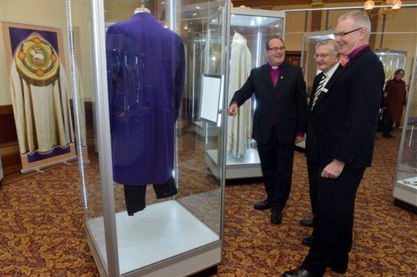 ON DISPLAY: Anglican Bishop of Bendigo Andrew Curnow, City of Greater Bendigo mayor Alec Sandner and Anglican Archbishop of Melbourne Dr Philip Freier visit the Faith in Fashion exhibition at The Capital.