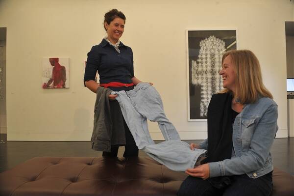 TOUGH GOING: Tamara Marwood and Verity Lougoon are looking for donations of denim for an exhibition. Picture: BRENDAN McCARTHY