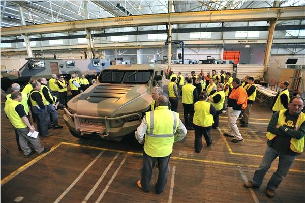 FIRST CONTACT: Thales staff get a close-up look at the vehicle capable of replacing an ageing Land Rover fleet.