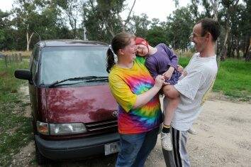RAPT: Cheri and David O’Connell with their daughter Tara and their newly repaired car.