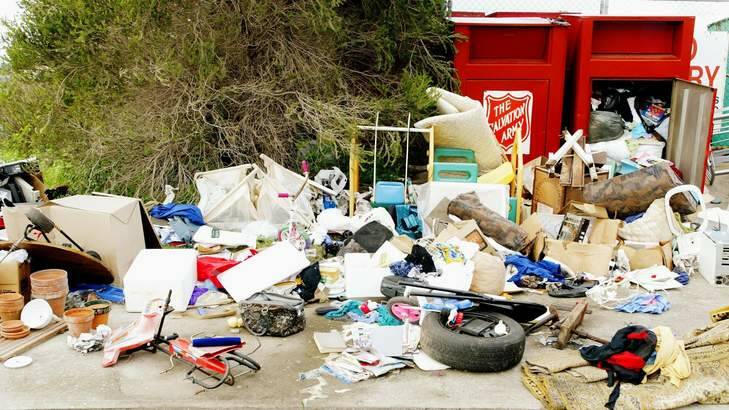 Useless donations: charity bins have become dumping sites as landfill costs rise. Photo: Fiona Lee Quimby