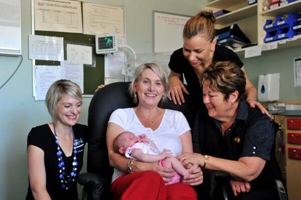 Relaxing: Laura Campbell from Loddon Mallee Kids, Emma Fodor with 4-week-old Lucia, Loddon Mallee Kids’ Ange Cail and St John of God Maternity Manager Shirley Lechmere test out the new breastfeeding chair donated from money raised at last month’s Pound the Pavement for Prems walk.