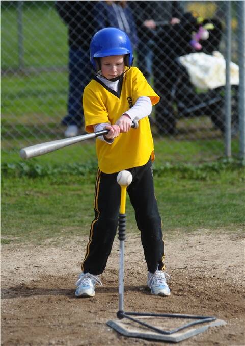 BIG HIT: Dodgers' Abbey Marcollo in the under-10 t-ball competition.