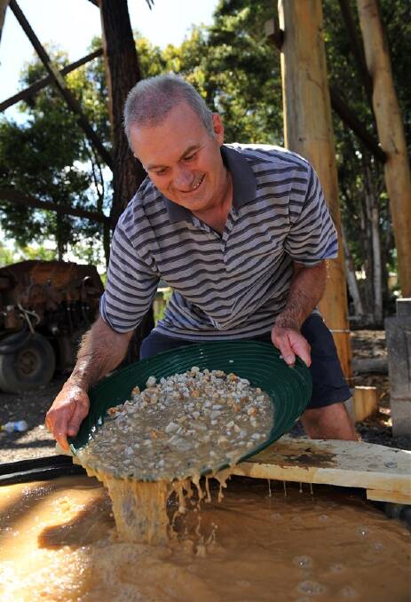 CHAMPION: Bendigo’s Peter Cox in action. He was overall champion in the Victorian Gold Panning Championships at Central Deborah Gold Mine on Saturday.                              Picture: JULIE HOUGH