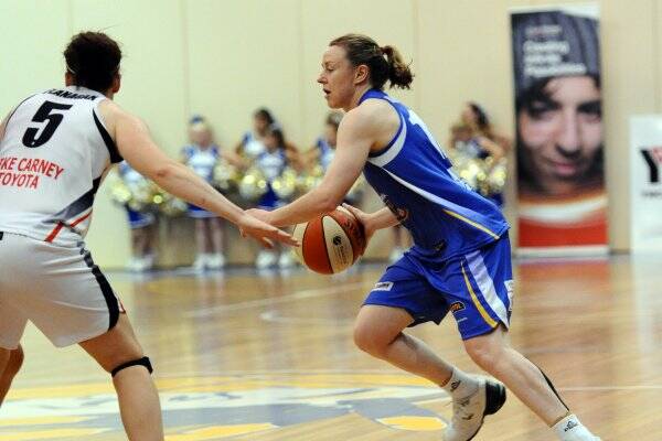 CLUTCH SHOT: Kristi Harrower’s last second heroics against Canberra guided the Spirit into third place.
