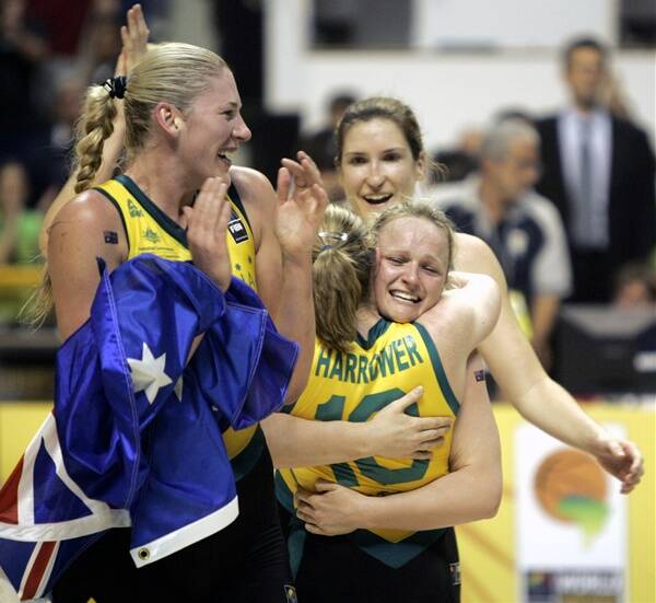 CHAMPS: Kristi celebrates the 2006 world title with her Opal teammates.