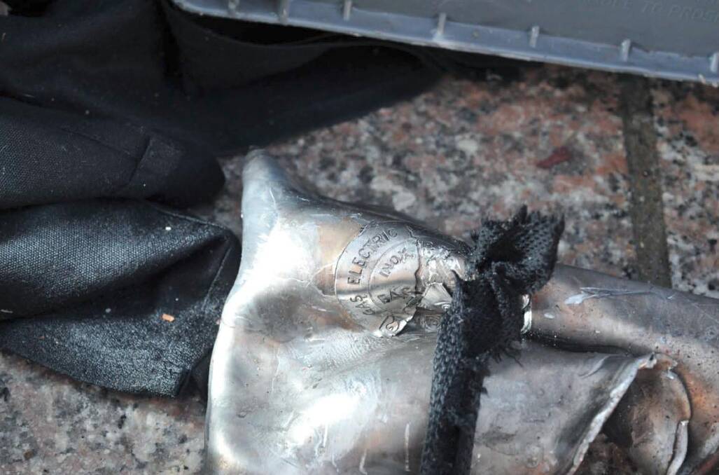 The remains of an explosive device, photographed by crime scene investigators. Photo: REUTERS