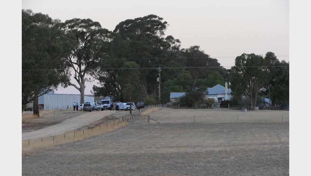 Police at a remote farmhouse where two males were found dead last week. Photo: JEREMY BANNISTER