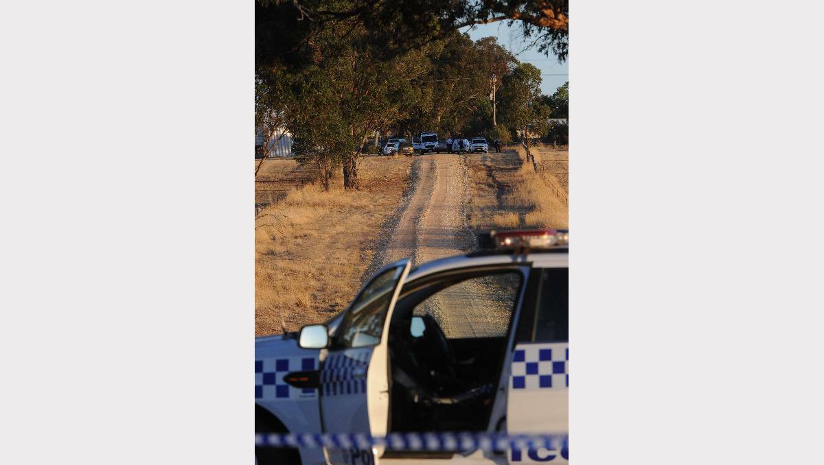 Police at a remote farmhouse where two males were found dead last week. Photo: JEREMY BANNISTER