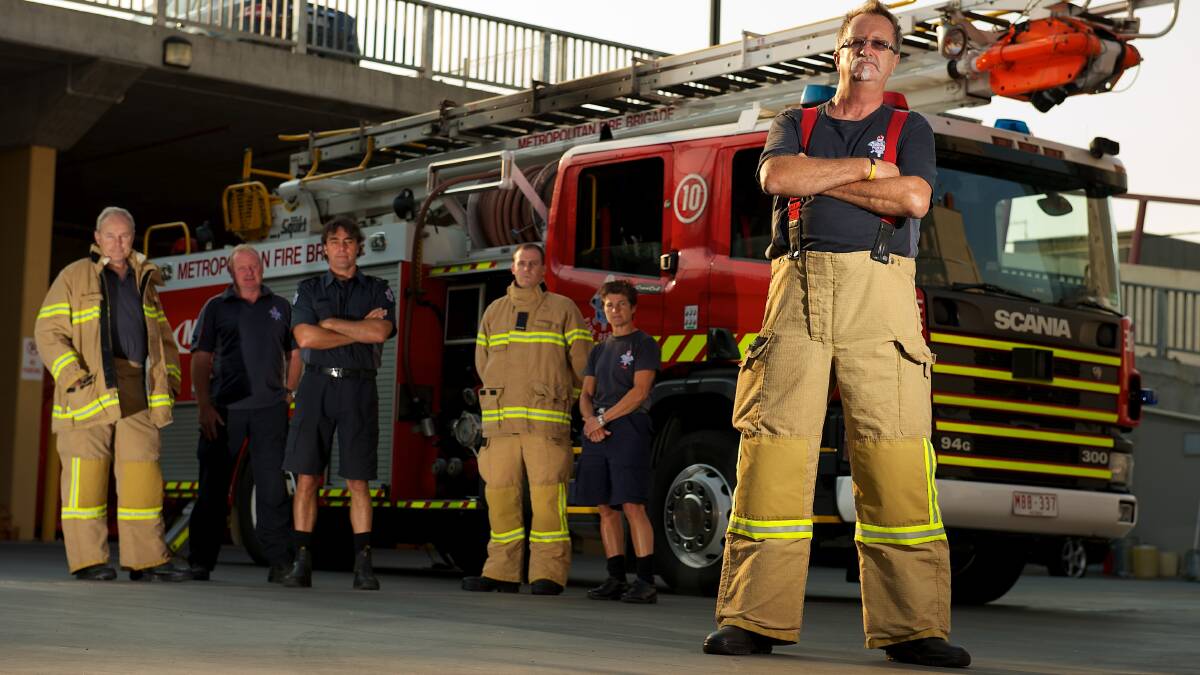 Firefighter Danny Ward, pictured with his colleagues, warns the post-traumatic stress disorder problem is 'just waiting to explode'. Photo: WAYNE TAYLOR