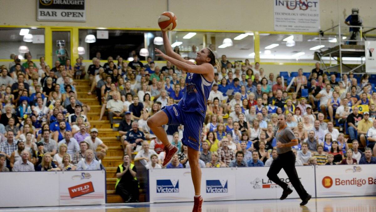 LAY-UP: Kelsey Griffin in Bendigo Spirit's WNBL grand final victory. Picture: JULIE HOUGH 