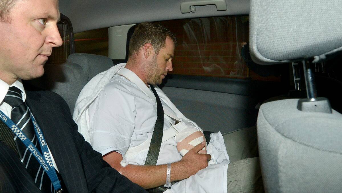 Ross Streeter in custody after his arrest in March. PICTURE: THE AGE