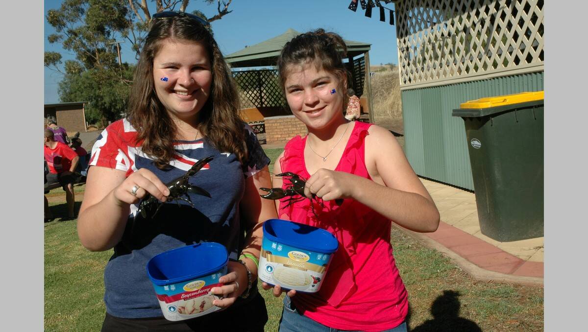 SNAPPY...Olivia Wardrop, 15, left, and her sister Chloe, 14, both of Wongyarra, display their entries in the big yabbie competition at Wirrabara on Australia Day.