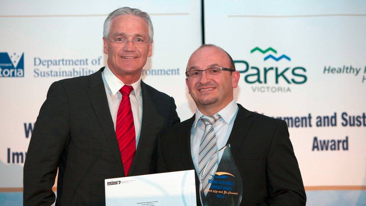Winner: Physiotherapist Theo Kapakoulakis, right, with the Member for Northern Victoria, Damian Drum. Picture: CONTRIBUTED