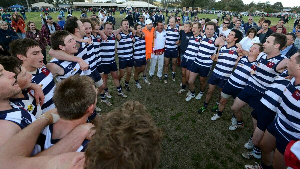 BACK-TO-BACK: Lockington-Bamawm United's players belt out the club song after a 94-point victory in the HDFL seniors grand final at Huntly. Picture: JIM ALDERSEY