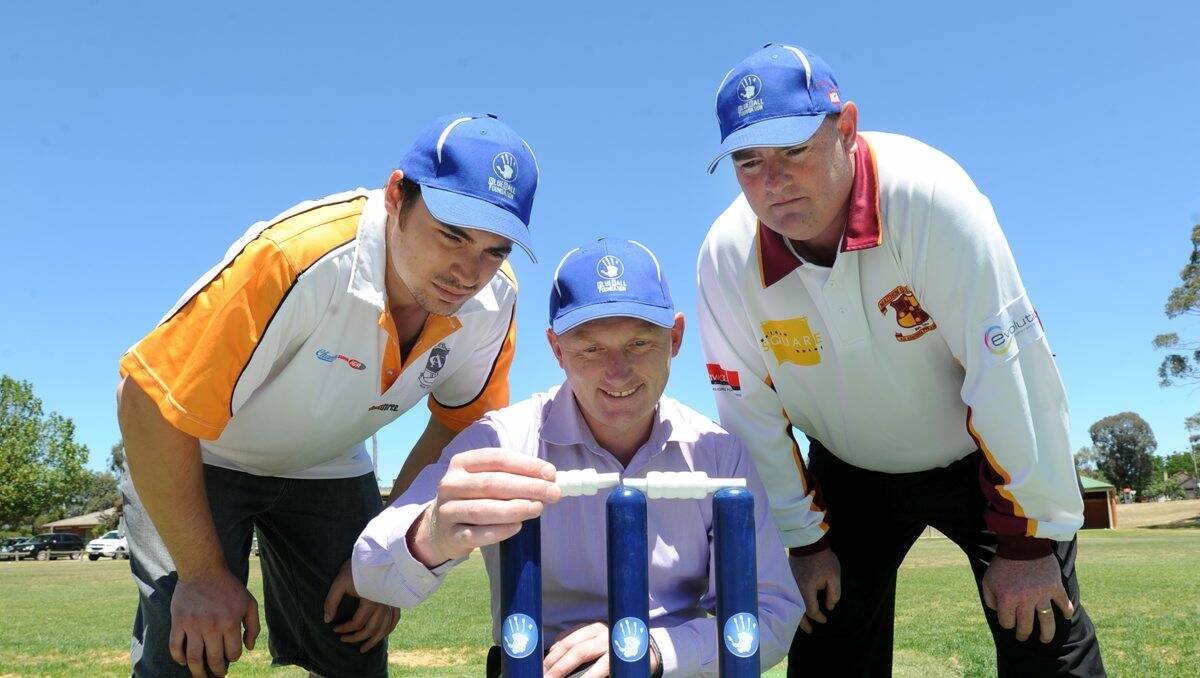 Details: Axe Creek vice captain Ashley Dixon, Champions IGA’s Graham Gamble and Maiden Gully captain Mark Roberts prepare for the Blue Ball Day match today. Picture: Peter Weaving